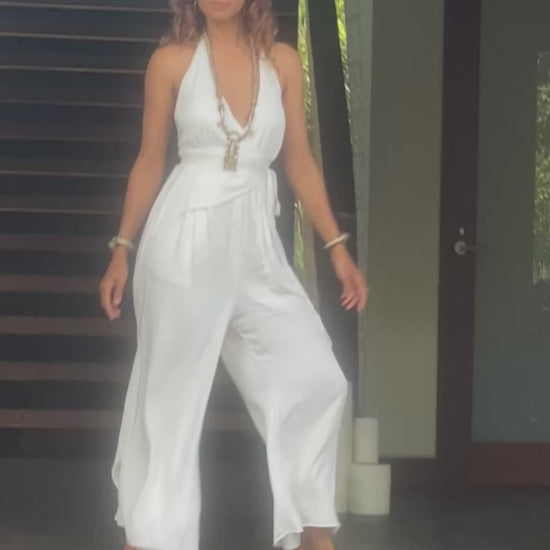 <img src="placeholder-image.jpg" alt="Dune Drifter Jumpsuit White - Elegant and Versatile Fashion Piece for Stylish Women in Australia" />

